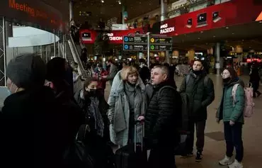 Passengers are seen at Moscow's Domodedovo airport on March 5, 2022, the day that Russia's S7 Airlines cancelled all its international flights because of sanctions imposed on Russia over the country's invasion of Ukraine. [AFP]