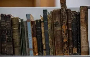 Forged copies of books identified as missing from its 19th-century Russian catalogue are seen at the University of Warsaw library in Warsaw, Poland, on November 14. A spate of thefts of rare Russian classics worth millions of euros from libraries across Eastern Europe has left a trail that points all the way to Moscow. [Wojtek Radwanski/AFP]