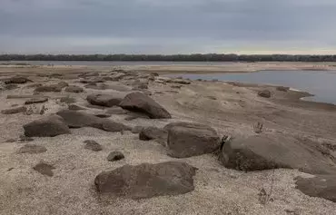 This photograph taken on November 8 shows a partly dry area of Kakhovka Reservoir, outside Zaporizhzhia. [Roman Pilipey/AFP]