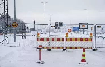 The closed Vaalimaa border station between Finland and Russia is pictured on December 7. Finland, which shares a 1,340km-long border with Russia, has seen a surge in third country undocumented migrants seeking asylum on its border with Russia in November, prompting a complete border closure until at least December 13. [Alessandro Rampazzo/AFP]