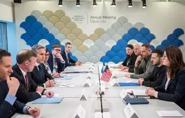 US National Security Advisor Jake Sullivan (2nd L) and US Secretary of State Antony Blinken (3rd L) speak with Ukrainian President Volodymyr Zelenskyy (2nd R) during a bilateral meeting at the annual World Economic Forum in Davos, Switzerland, on January 16. [Fabrice Coffrini/AFP]