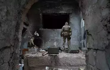 A Ukraine police mine-clearing unit inspects a grain elevator used as a Russian military base during the occupation in Snihurivka, Mykolaiv province, on November 16, 2022. [Ihor Tkachov/AFP]