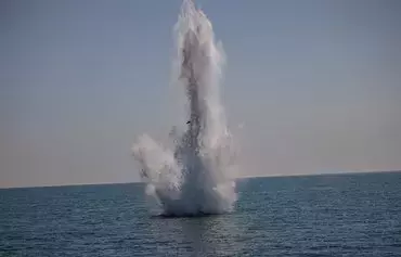 A naval mine explodes during the Breeze 2022 multinational maritime exercise in the Black Sea on July 22, 2022. [Dimitar Dilkoff/AFP]