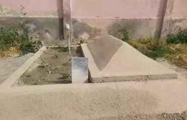 A fresh grave is shown in Margilan, Uzbekistan, last May 31. This is the final resting place for Shokhrukh Tozhiboyev, who was killed by a drone fragment in Ukraine. [File]