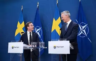 Swedish Prime Minister Ulf Kristersson (left) and NATO Secretary General Jens Stoltenberg address a news conference on October 24 in Stockholm, Sweden, where Stoltenberg attended the 2023 NATO-Industry Forum themed 'Addressing the New Strategic Reality Together.' [Jonathan Nackstrand/AFP]