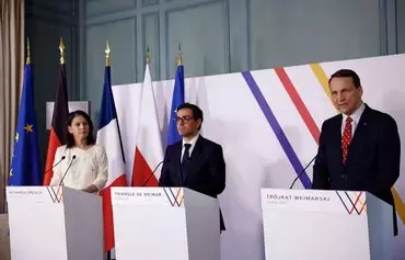 (Left to right) German Foreign Minister Annalena Baerbock, French Foreign and European Affairs Minister Stephane Sejourne and Polish Foreign Minister Radoslaw Sikorski attend a news conference after meeting near Paris on February 12 to launch a joint initiative to fight Russian disinformation attacks. [Sarah Meyssonnier/AFP]