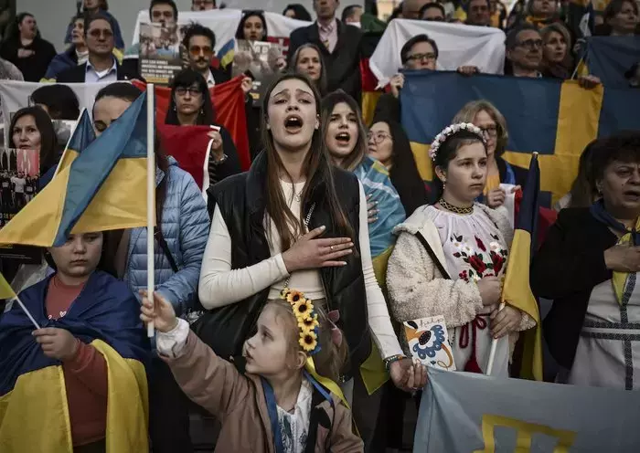 Demonstrators rally to mark the second anniversary of the Russian invasion of Ukraine, in Athens on February 24. [Aris Messinis/AFP]