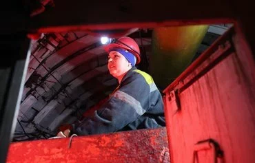 An electric locomotive driver, Victoria Avramchuk, 33, is seen at her workplace in one of the coal mines of DTEK Pavlogradvugilya, in Dnipropetrovsk province, Ukraine, on February 27 amid the Russian invasion of Ukraine. [Anatolii Stepanov/AFP]