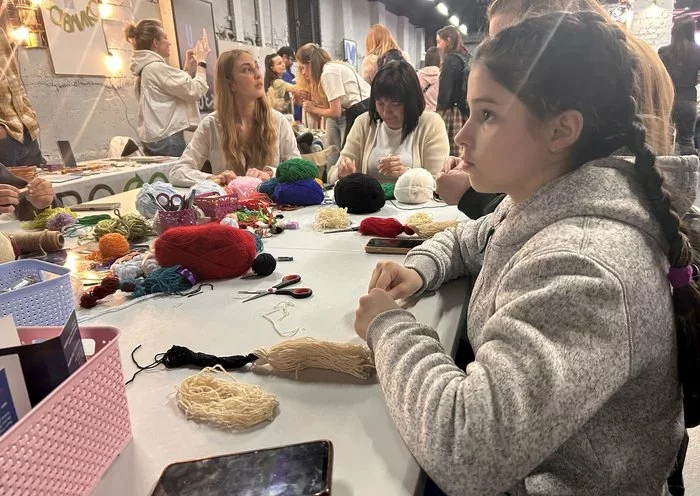 A master class on making toys and talisman motanka rag dolls. For children this was a rare opportunity to be out in public; almost all the schools in Zaporizhzhia are closed by constant shelling. [Olha Chepil/Kontur]