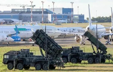 Patriot long-range air defense systems of the German armed forces are deployed at Vilnius Airport ahead of the NATO summit in Vilnius last July 7. Lithuanians vote on May 12 in the first round of a presidential election focused on defense issues, as the Baltic state seeks to boost its security in the face of Russia. [Petras Malukas/AFP]