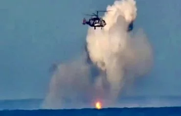 A Ukrainian naval drone detonates after being hit by a Russian helicopter May 6. [Mil.in.ua]