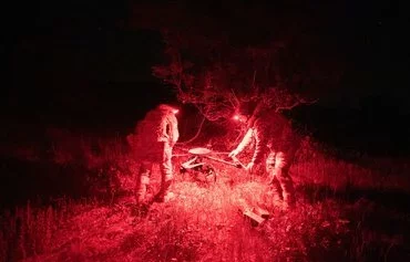 Ukrainian troops check a Vampire drone after а mission near Chasiv Yar, Donetsk province, on May 1 amid the Russian invasion of Ukraine. [Genya Savilov/AFP]