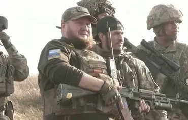 Latin American soldiers have enlisted in the Simón Bolívar battalion of the Ukrainian army to assist in repelling the Russian invasion. Shown is a screenshot from a video by Univision News.