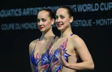 Ukraine's Maryna and Vladyslava Aleksiiva compete in the Women's Artistic Swimming duet technical final during the World Aquatics Artistic Swimming World Cup 2023 in Montpellier, France, on May 5, 2023. [Sylvain Thomas/AFP]