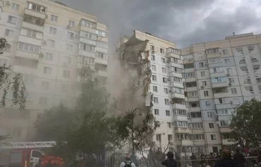 This photograph shows an apartment building that was damaged by a strike in Belgorod, Russia, May 12. [AFP]