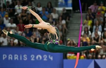 Ukraine's gymnasts perform in the rhythmic gymnastics group all-around final at the Paris Olympics August 10. [Gabriel Bouys/AFP]