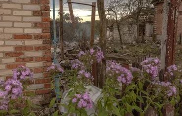 This photograph shows destroyed houses following recent Russian shelling in the Ukrainian village of Loknya, in Sumy province, near the border with Russia, on August 13, amid the Russian invasion of Ukraine. [Roman Pilipey/AFP]