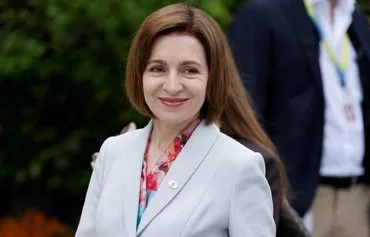 Moldovan President Maia Sandu arrives for the Summit on Peace in Ukraine, held near Lucerne, Switzerland, on June 15. [Ludovic Marin/AFP]