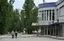 
Pedestrians walk along a street in Korabel district, Kherson province, Ukraine, on June 2 amid the Russian invasion of Ukraine. [Genya Savilov/AFP]        