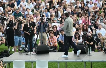 Not long after Russian dissident Ilya Yashin was freed in a major prisoner swap with the West, he received a hero's welcome August 7 in Berlin, a growing center for exiled Russian activists.[Ralf Hirschberger/AFP]