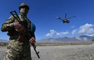 Participants take part in joint military drills by the Collective Rapid Response Forces of the Collective Security Treaty Organisation (CSTO) member states, at the Edelweiss training area in Balykchy, northern Kyrgyzstan, on September 11. [Vyacheslav Oseledko/AFP]