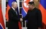 
In this pool photograph distributed by the Russian state agency Sputnik, North Korea's leader Kim Jong Un (right) and and Russian President Vladimir Putin shake hands after a welcoming ceremony at Kim Il Sung Square in Pyongyang on June 19. The visit laid the groundwork to boost defence ties between the two nuclear-armed countries as Moscow pursues its war in Ukraine. [Gavriil Grigorov/POOL/AFP]        